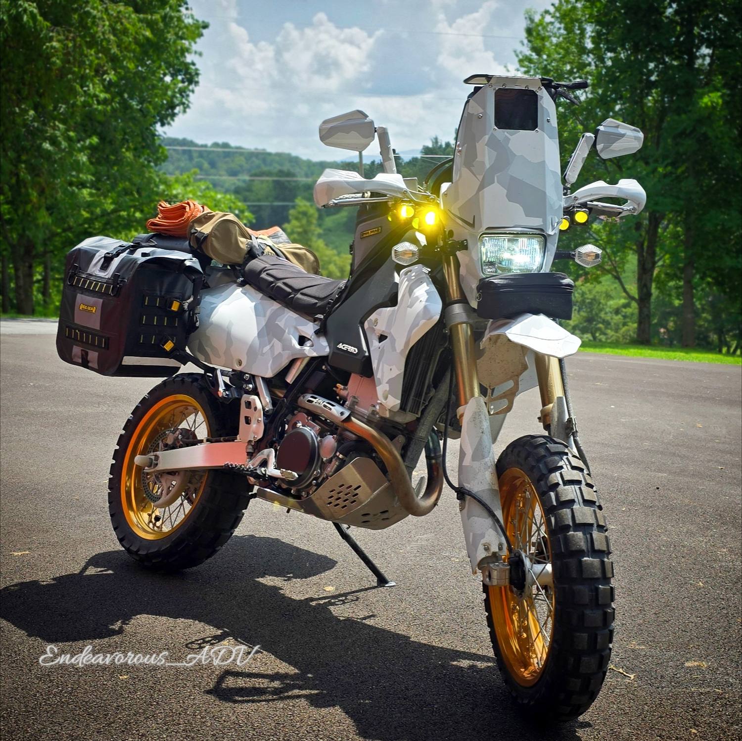 Camo adventure bike running a 520 chain