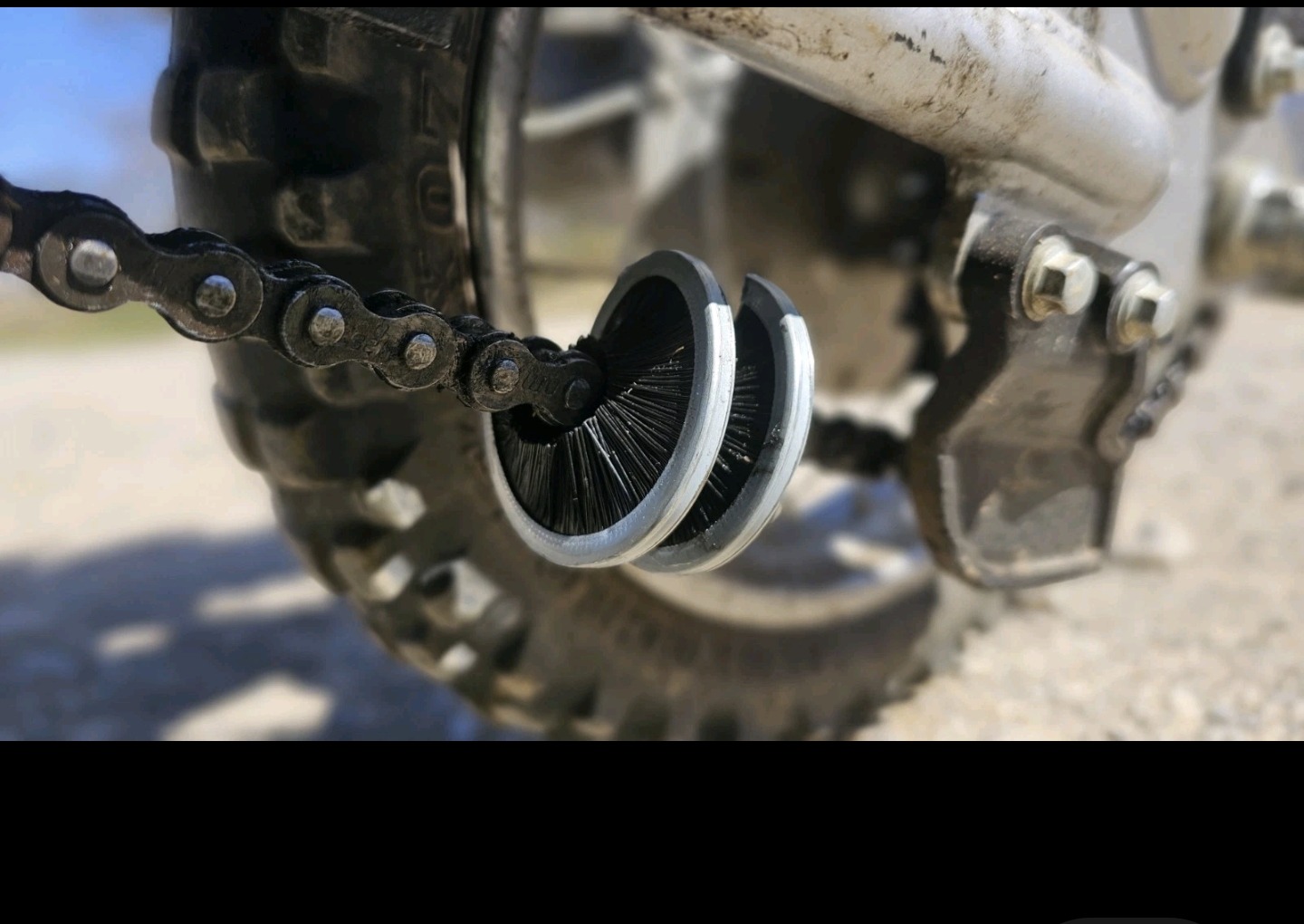 The CC360 wrapped around a motorcycle chain in real use